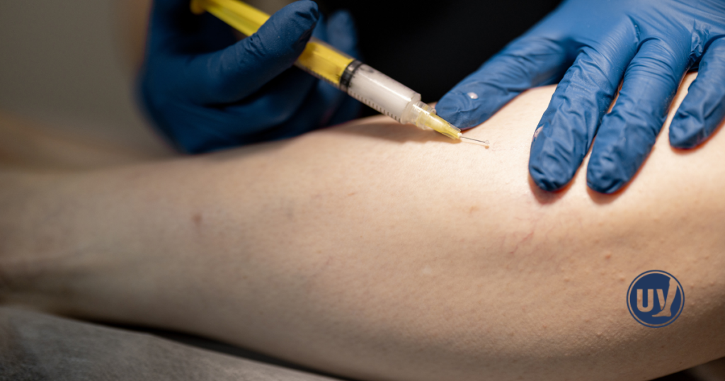 Specialist treating leg veins to restore healthy blood flow