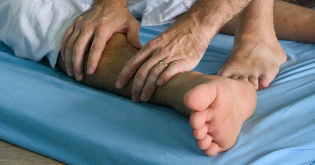 Vascular specialist assessing patient's leg who commented about a weak pulse in legs