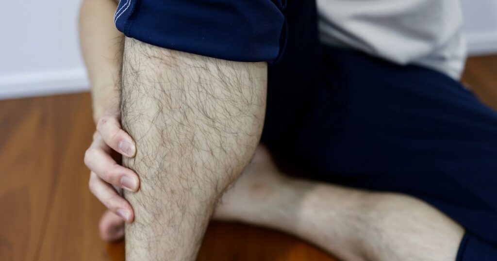 A person experiencing weak and numb Legs