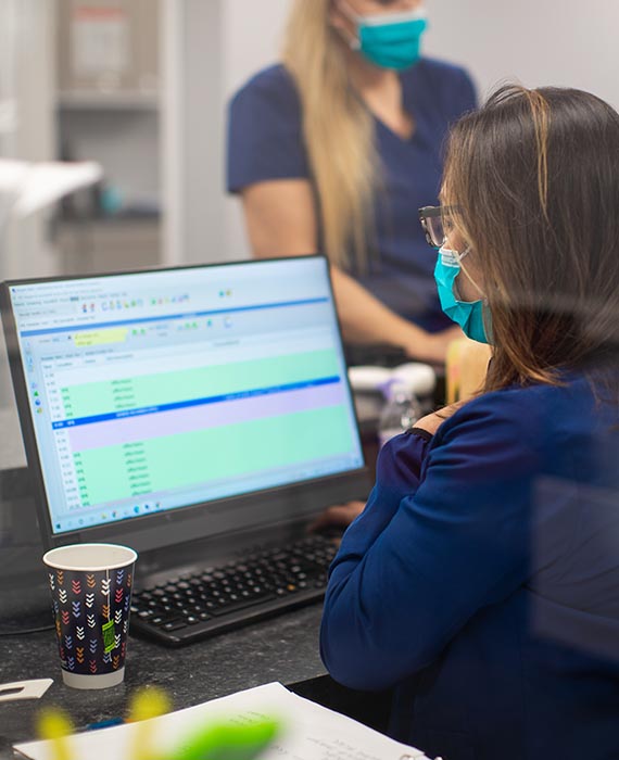 Care team providing vascular treatment