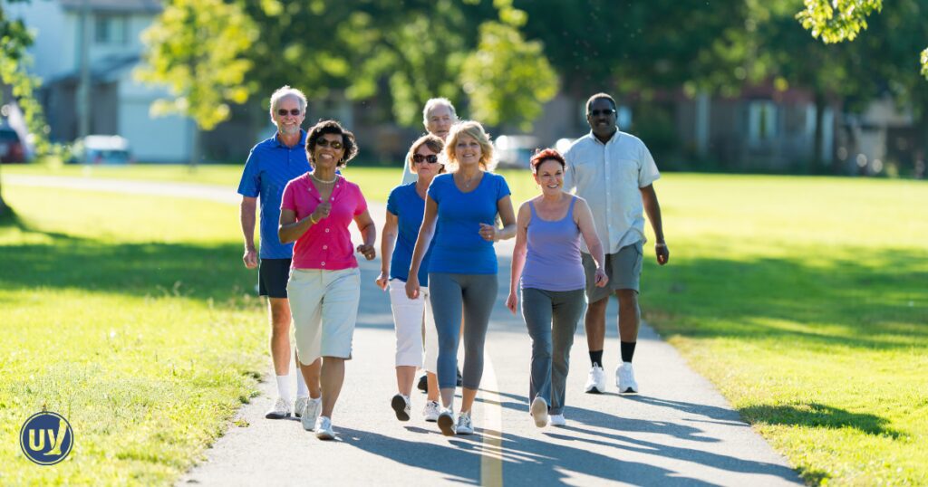 Group of people walking to reduce symptoms of PAD