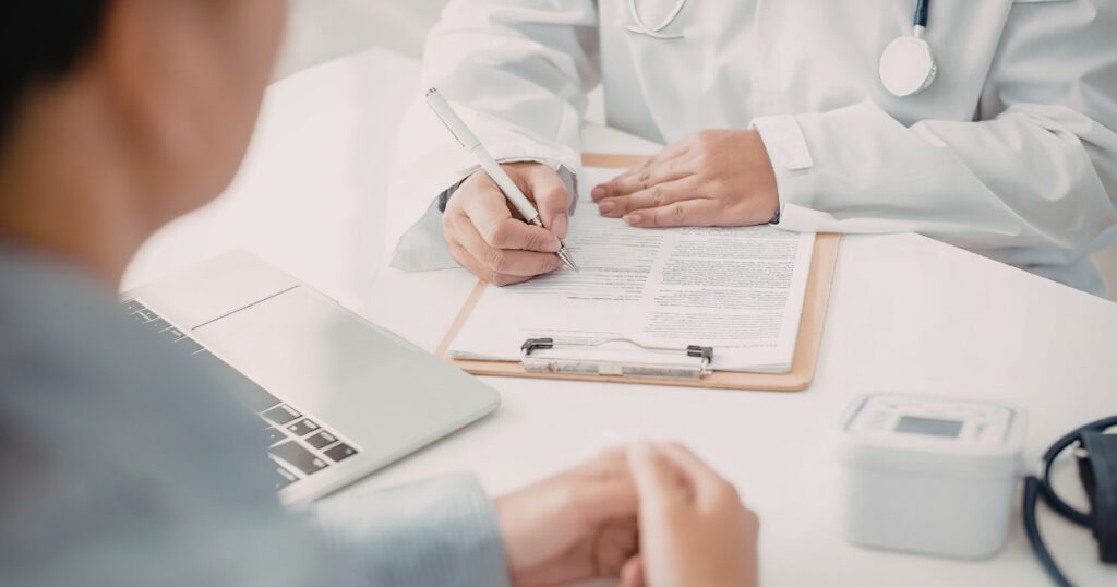 Vein specialist diagnosing CVI