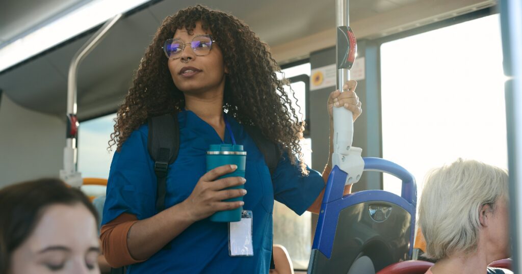 Woman commuting in Atlanta illustrating how standing or sitting for too long can cause vein issues