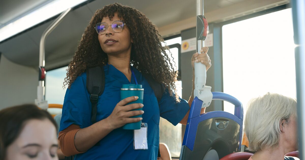 Woman commuting in Atlanta illustrating how standing or sitting for too long can cause vein issues