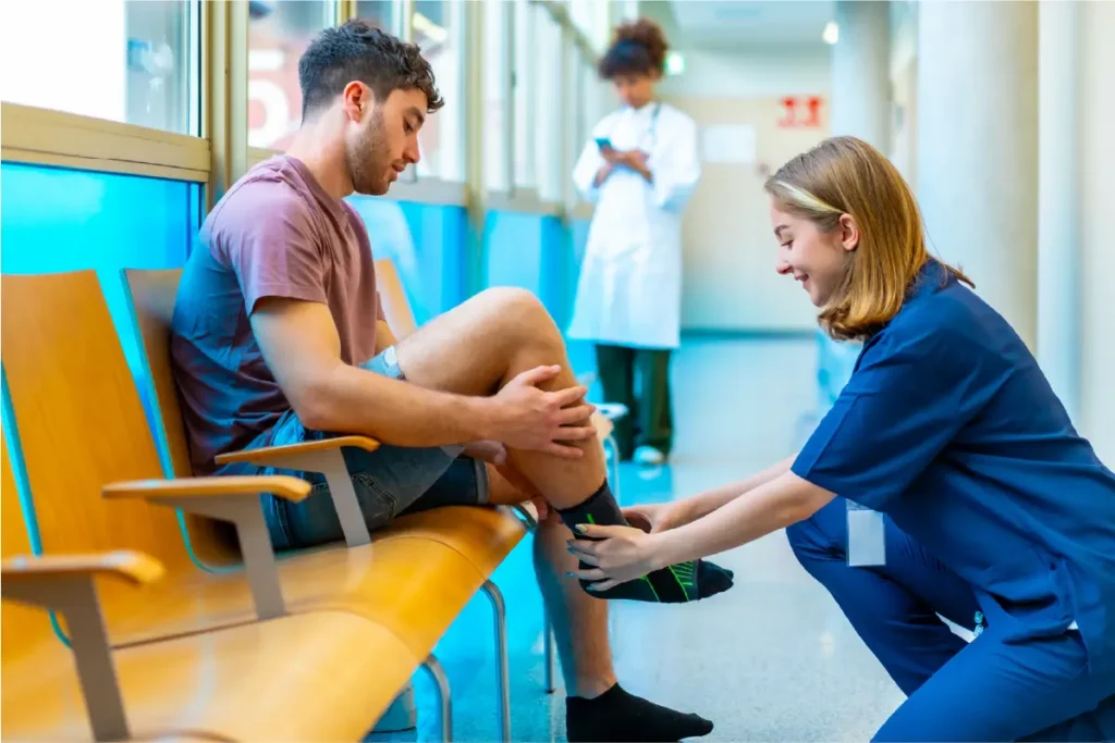 Man using compression socks for varicose veins