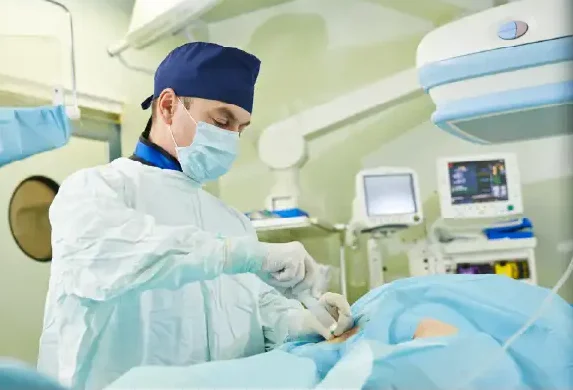 A vein doctor performing a vein treatment procedure