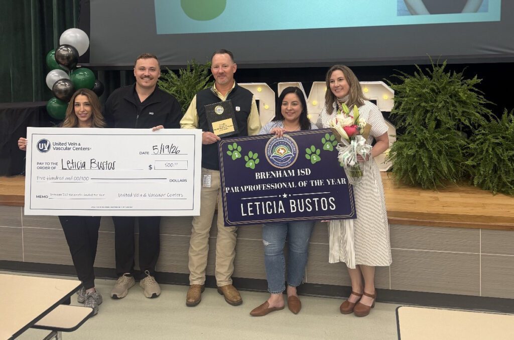 Brenham ISD District Paraprofessional of the Year Leticia Bustos recognized during an award presentation with community partners and school leaders.