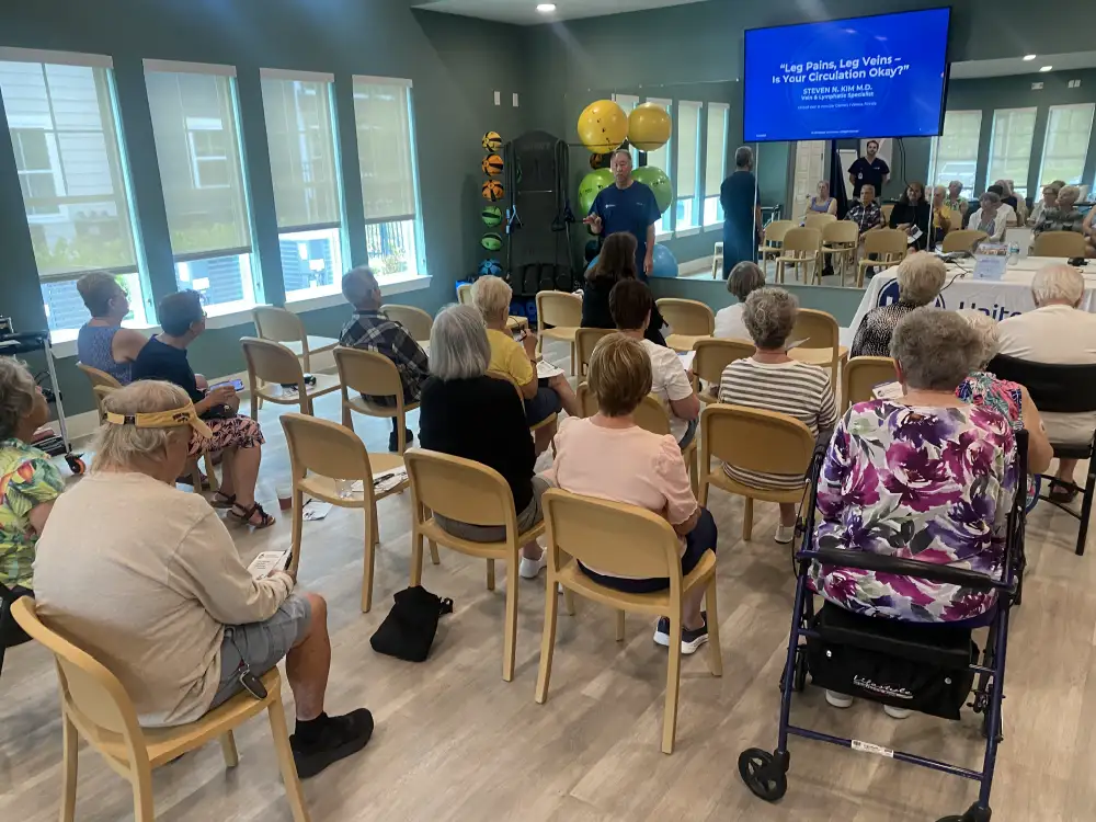 United Vein & Vascular Centers vein specialist, Dr. Steven Kim speaks to a room of senior citizens about vein health in Venice, FL