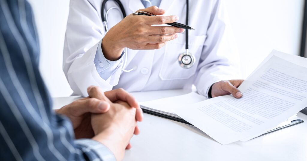Vein specialist in Goodyear discussing vein treatment options and insurance coverage with patient