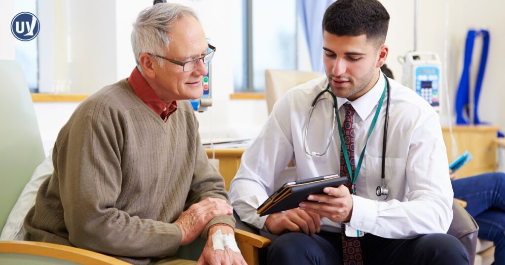 vein specialist discussing vein treatments with patient