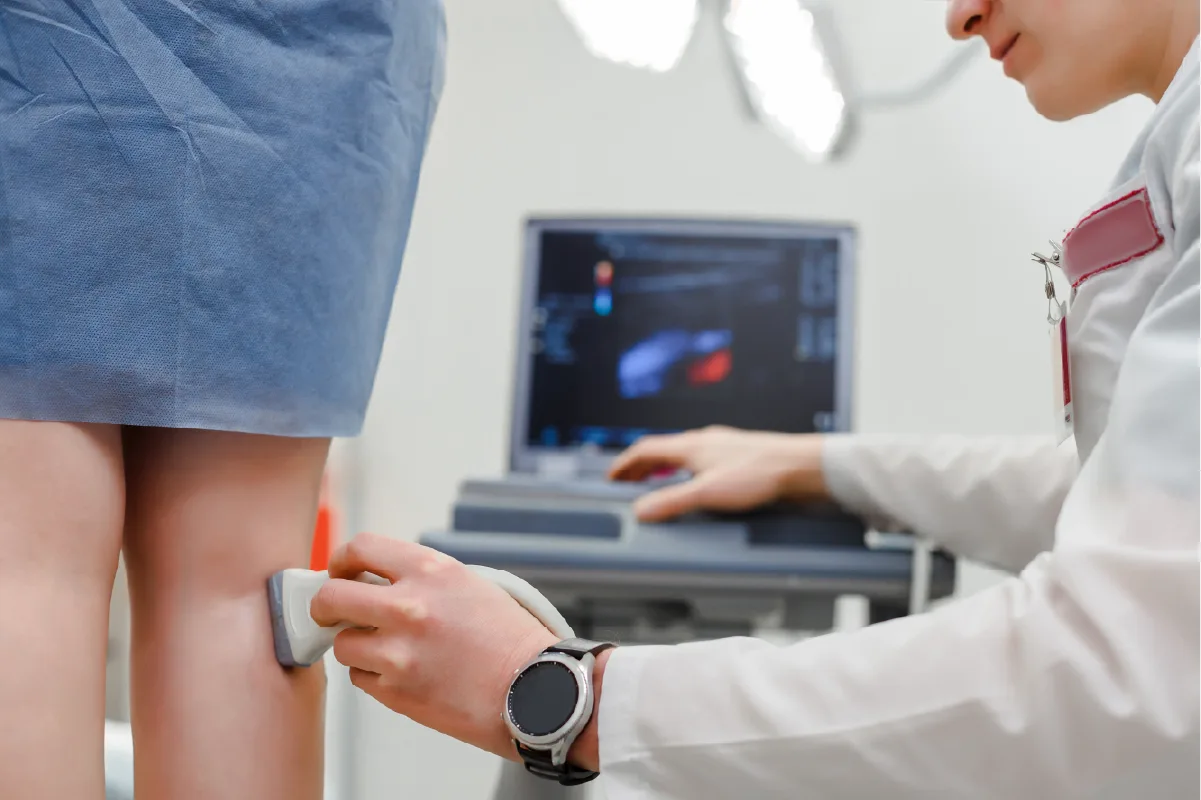 A vein doctor performing ultrasound guided sclerotherapy in Newnan, GA