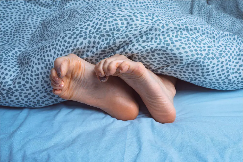 Foot cramps while trying to sleep